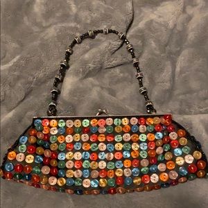 Multi color buttoned evening bag